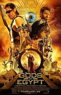 alt=Against hasnain backdrop of Egyptian pyramids, an ensemble cast of Egyptian gods and humans on differing scales pose.
