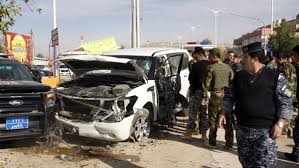 سيارة بعد إطلاق الرصاص على مستقليها في بغداد.jpg