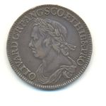 A 1658 issue Cromwell half-crown, with the Latin inscription OLIVAR D G RP ANG SCO ET HIB &c PRO, translated as "Oliver, by the Grace of God of the Republic of England, Scotland and Ireland etc. Protector".