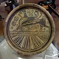7th century BC plate with sphinx from Rhodes, Louvre.