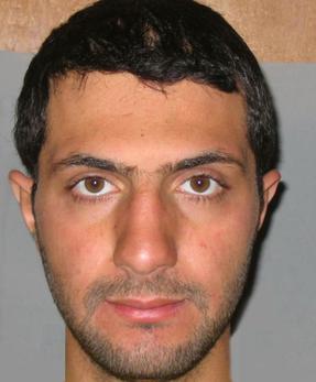 أبو محمد الجولاني في صورة ملتقة أثناء اعتقاله في معسكر بوكا بالعراق، ويعتقد أنها التقطت ما بين 2006 إلى 2007.