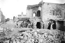 This is the Russian Monastery of Ascension on the Mount of Olives in which three people were killed. On the iron gate on the left, we can read : РУССКАЯ ДУХОВНАЯ МИССИЯ (Russian Ecclesiastical Mission)