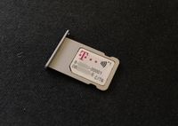 Deutsche Telekom nano-SIM Card with NFC capabilities in the SIM tray of an iPhone 6s