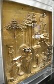 Angled view of a panel with the story of Abraham from the Gates of Paradise
