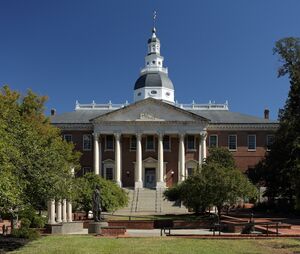 A large, impressive public building, with a pillared facade and a cupola