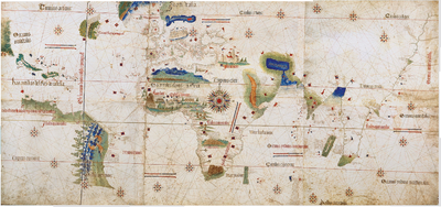 Photograph showing an old map which covers the area from the Atlantic coast of the South American continent eastwards around Africa to India and on to the Malay peninsula at the eastern edge of the map, with Europe in the far north.