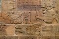 Sandstone wall of King Aspelta offering Ma'at (Truth) to ram-headed god Amun-Re accompanied by Anukis, Temple T at Kawa. Ashmolean Museum I9J2.I295.[3]