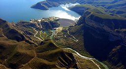The Amazon flows from Peru east through Brazil to the Atlantic. It drains the northwest two-thirds of Brazil, the eastern three-fourths of Peru, the northern third of Bolivia, and a bit of Colombia. Its main tributaries are the Negro in the north, the Madeira, Xingu, and Tocantins in the south, and the Marañón and Ucayali in Peru.