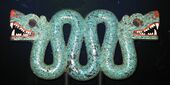 Double-headed serpent; 1450–1521; cedro wood (Cedrela odorata), turquoise, shell, traces of gilding & 2 resins are used as adhesive (pine resin and Bursera resin); height: 20.3 cm, width: 43.3 cm, depth: 5.9 cm; British Museum (London)