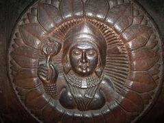 Female Figure holding a Lotus