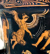 Lyssa, winged and holding a goad