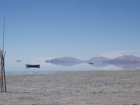 Aymara in traditional dress (left); Poopó Lake was the dominant geographical feature around Evo's home village of Isallawi (right).[4]