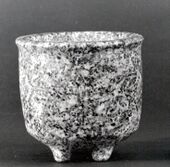 Footed bowl in granite, Syria, end of 8th Millennium BCE.