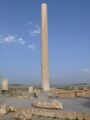 An erect column found in the ruin complex of Cyrus's private palace. Unlike Apadana columns no fluting is used