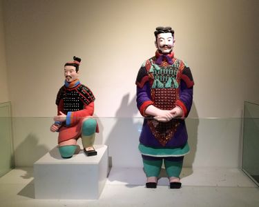 Restored painted archer and high-ranking officer