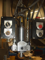A high pressure mix head, showing simple controls. Front view.