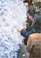 Tying Omikuji at Kasuga Shrine