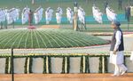 The Prime Minister, Dr. Manmohan Singh performing parikrama at the Samadhi of the former Prime Minister, Pandit Jawaharlal Nehru on his 122nd birth anniversary, at Shantivan, in Delhi on November 14, 2011.jpg
