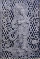 Openwork playing flute Bodisattva in Octagonal Lantern Tower (8th century).