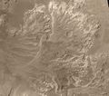 Probable delta in a crater to the NE of Holden Crater, as seen by Mars Global Surveyor. Image in Margaritifer Sinus quadrangle.