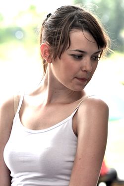 Woman in white top looking to her left 22March2009.jpg