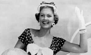 Miriam Stevenson with globe (cropped) (cropped).jpg