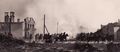 Polish cavalry galloping through a bombed town during the German invasion of Poland in 1939.