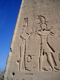 Left: reliefs of Cleopatra and Caesarion at the Temple of Dendera Right: a limestone stela of the High Priest of Ptah bearing the cartouches of Cleopatra and Caesarion, Egypt, Ptolemaic Period, the Petrie Museum of Egyptian Archaeology, London