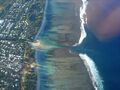 L’Ermitage les Bains lagoon in front of Saint Paul, and its pass through the coral reef