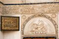Stone relief above the entrance door