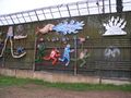 Mural on the Sonora side of the US-Mexico border in Nogales. It depicts the harsh realities of illegal immigrants travelling through the Sonoran desert. The wall itself, at this location, is constructed of Korean War-era perforated steel matting used as makeshift runways and landing strips.