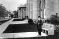 Circa about 1915 - Standing near his statue on the Cornell campus