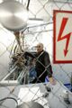 Eduard Kozulin, head of group at the Laboratory of Nuclear Reactions, checking the experiment readiness of the super sensitive analyzer of heavy atoms mass.