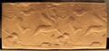 Winged centaur hunting animals. Kassite period. Louvre Museum, reference AO 22355