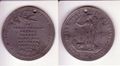 A medallion issued to celebrate the end of the Crimean War and the Treaty of Paris, made from a soft, "silver colour" alloy