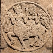 Female riding a Centaur.