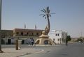 تمثال النخلة بقبلي ويرى خلفه مقر اتحاد الشغل