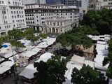 Greenmarket Square as it normally appears with many market stalls, seven days before the lockdown.