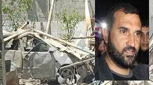 أبوهربيد وسيارته بعد الاغتيال.jpg