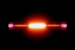 A clear tube with a red light emanating from it