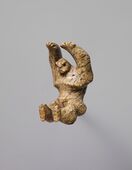 Hawaiian pendant; 18th–19th century; whalebone; height: 6 cm, width, 3.8 cm; Metropolitan Museum of Art (New York City)
