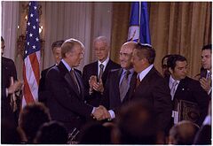 Jimmy Carter and General Omar Torrijos signing the Panama Canal Treaty.jpg