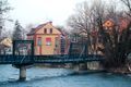 Museum Arbeitswelt on the Steyr river; in August 2002 the river rose up to the bridge railings and damaged it extensively.
