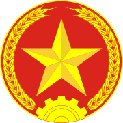 Emblem of People's Army of Vietnam, depicting golden star, gear and two strands of wheat