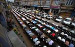 Kashmiri Muslims pray on a street on the third Friday of Ramadan, in Srinagar, India, Friday, Aug. 27, 2010. (AP Photo/Altaf Qadri)