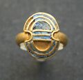 Gold finger ring with lapis lazuli inlays in the shape of a double axe