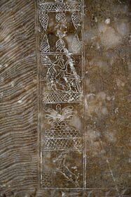 Detail of the embroidered dress of a male Apkallu, showing a kneeling winged Apkallu. من نمرود، Iraq. 883-859 ق.م.. متحف الشرق القديم، اسطنبول