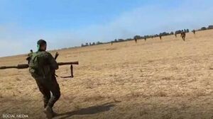 أحد مقاتلي القسام خلال معركة داخل قاعدة زيكيم العسكرية.jpg