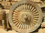Horse-drawn chariot carved onto the mandapam of Airavateswarar temple, Darasuram, c. 12th century AD (left). The chariot and its wheel (right) are sculpted with fine details
