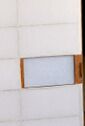 rectangle with paper cut away, and other side papered, and vertical groove in frame, allowing this shoji to be opened from the outside